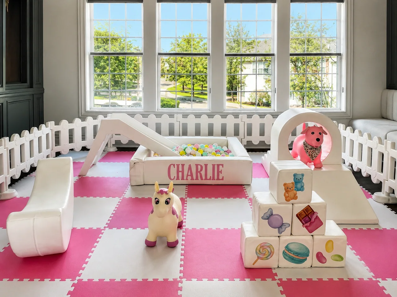 Charlie birthday soft play setup with pink and white equipment